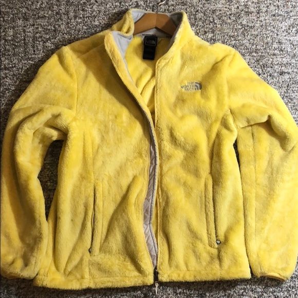 yellow fuzzy north face jacket